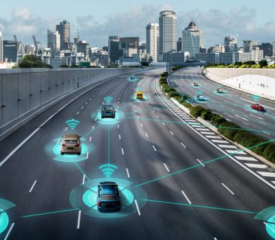 GNSS for autonomous vehicles showing multi-sensor connectivity and positioning on city roads